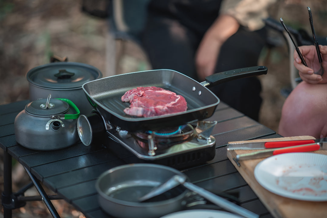 COOKING EQUIPMENT FOR OUTDOOR USE